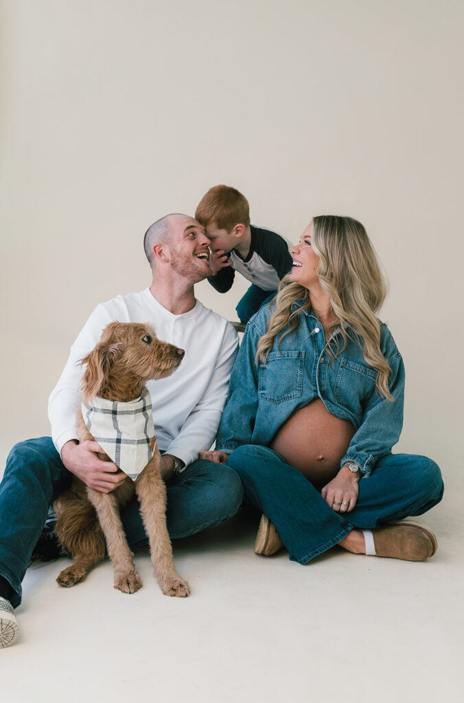 The whole family laughing together for a maternity session.